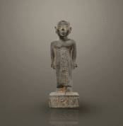 The priest depicts an ancient Egyptian priest seated in black granite