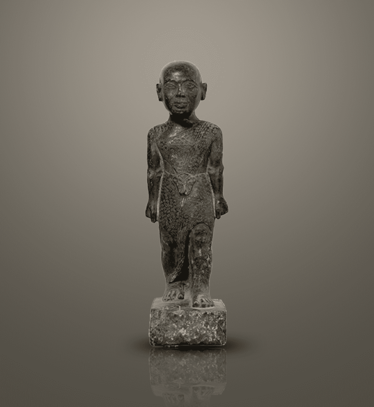 Granite statue of an Egyptian priest, representing spiritual strength and religious authority.