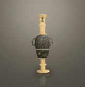 Obsidian and burnt lime amulet with a carved scarab