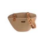 Offa Bag handmade woven tote with colorful embroidered straps, showing clear details of the strap, from a top view.