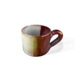 Shining Civilization handmade ceramic mug with gradient glaze in bronze and maroon tones.