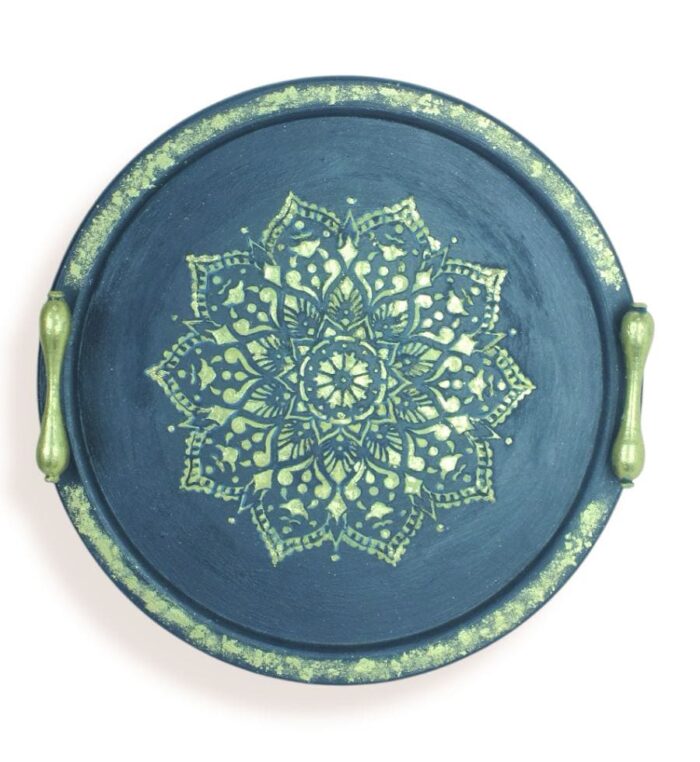 Navy wooden tray with gold handles and intricate lace-style golden mandala.
