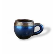 Hidden Treasures handcrafted ceramic mug with metallic blue and bronze glaze finish.