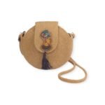 Nefertiti Glow handmade woven straw bag with Egyptian Queen Nefertiti artwork and shoulder strap.