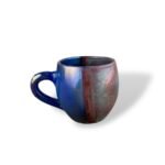 Convergence Civilizations handcrafted ceramic mug with dual-tone blue and maroon glaze finish.