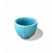 Pharaoh’s Imprint handmade ceramic cup with glossy turquoise blue glaze inspired by ancient Egyptian faience.