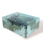 Closed Box London with London cityscape design on the lid, clock motif, and floral accents.