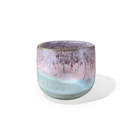 Nile’s Glow handmade ceramic cup with pastel pink and turquoise gradient glaze.