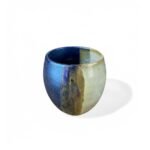 Specter of Civilization handmade ceramic cup with round form and blue-beige gradient glaze.