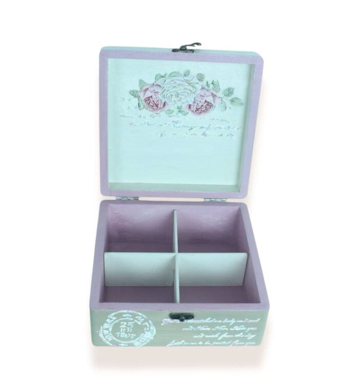 Front view of decorative wooden box with compartments and open lid featuring rose illustration