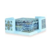 Set of decorative coasters with colorful geometric tile patterns in a matching holder.