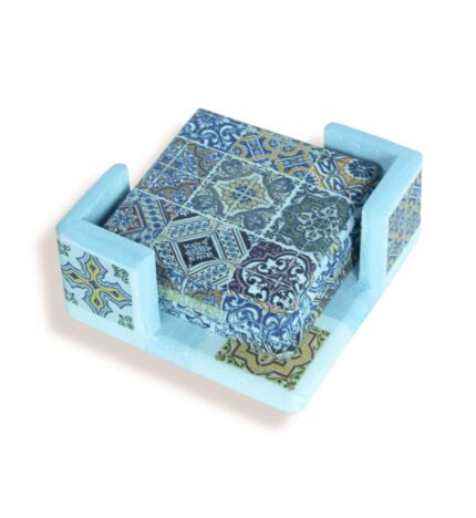 Top view of decorative coaster set featuring colorful geometric tile patterns in a matching holder.