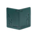 Back view of an emerald green leather passport cover embossed with pharaonic Egyptian deities and symbols.