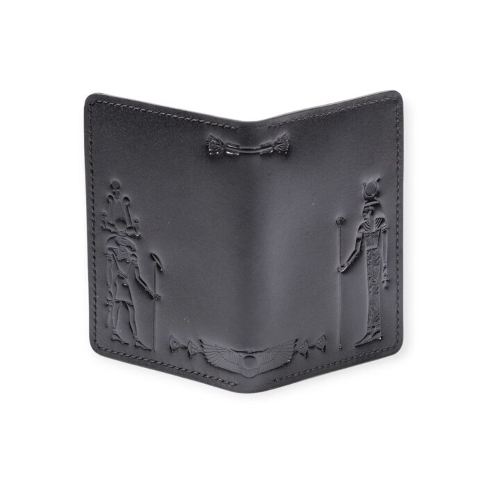 Back view of a black leather passport cover embossed with ancient Egyptian deities and pharaonic symbols.