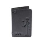 Closed black leather card holder with an embossed figure of the ancient Egyptian sun god Ra.