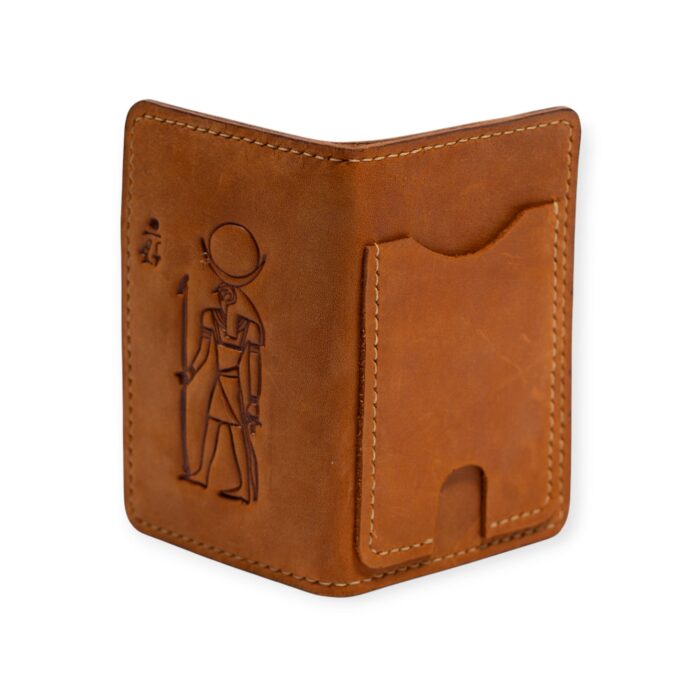 Handcrafted leather card holder in Light Havana color featuring an embossed ancient Egyptian figure.