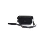 Back view of black small crossbody leather bag with embossed logo and adjustable strap.
