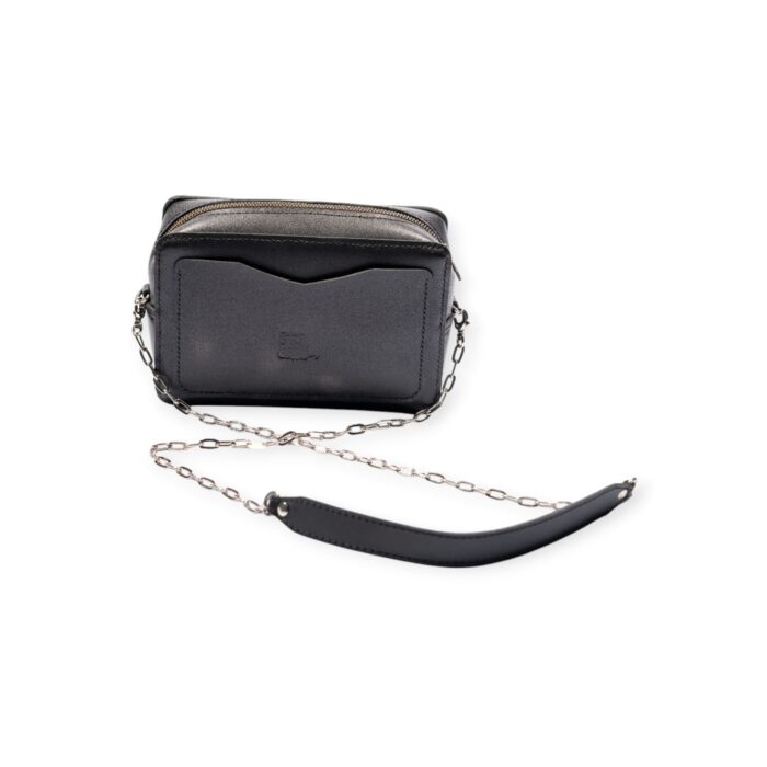 Back view of black leather rectangle crossbody bag with external pocket and silver chain strap.