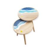 Wave resin wood tables with round tops and ocean-inspired blue resin design