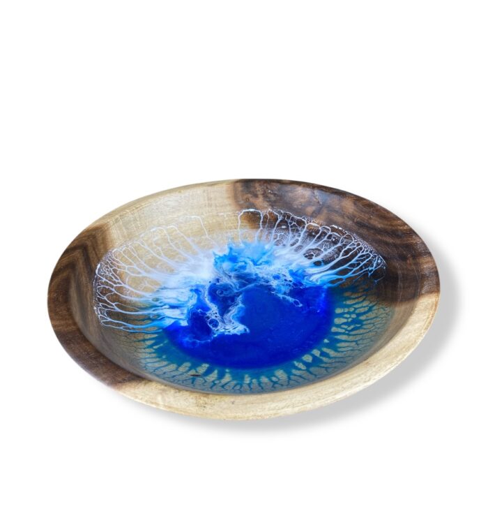 large wood resin bowl on coffee table