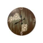 Rustic wooden wall clock with carved floral design and large vintage numbers.