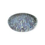 Round wooden tray with alternating blue and white stripes, offering a vibrant and stylish design.