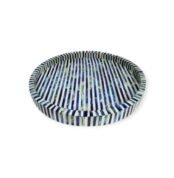 Round wooden tray with alternating blue and white stripes, offering a vibrant and stylish design.