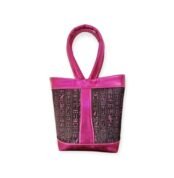 Pharaonic handbag in fuchsia with black hieroglyphic panels and a looped top handle