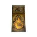Vintage-style wooden tableau featuring a classical lady portrait and ornate carvings.