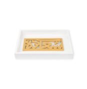 Arabic wooden plaque in mustard yellow placed inside a white rectangular tray