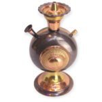 Orb-shaped copper hookah with dual-tone finish and intricate detailing on the front panel