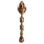 Tall Royal Torch hookah with intricate brass cutouts and a crown-shaped top, inspired by Arabian torches