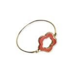 Coral Bloom Bangle with gold-tone band and coral-hued open floral motif on white background