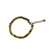 Gold-tone bracelet with laurel leaf-shaped links and adjustable chain on white background