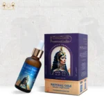CairoCharm Hair Oil bottle with packaging, placed next to the product box.