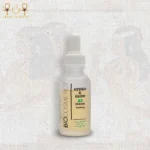 Hydra & Glow B5 serum with hyaluronic acid in a frosted glass dropper bottle, upright on textured background.