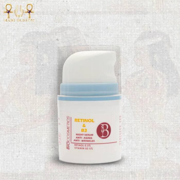 Retinol and Vitamin B3 night serum in a white 30ml pump bottle with blue accents, upright on textured background.