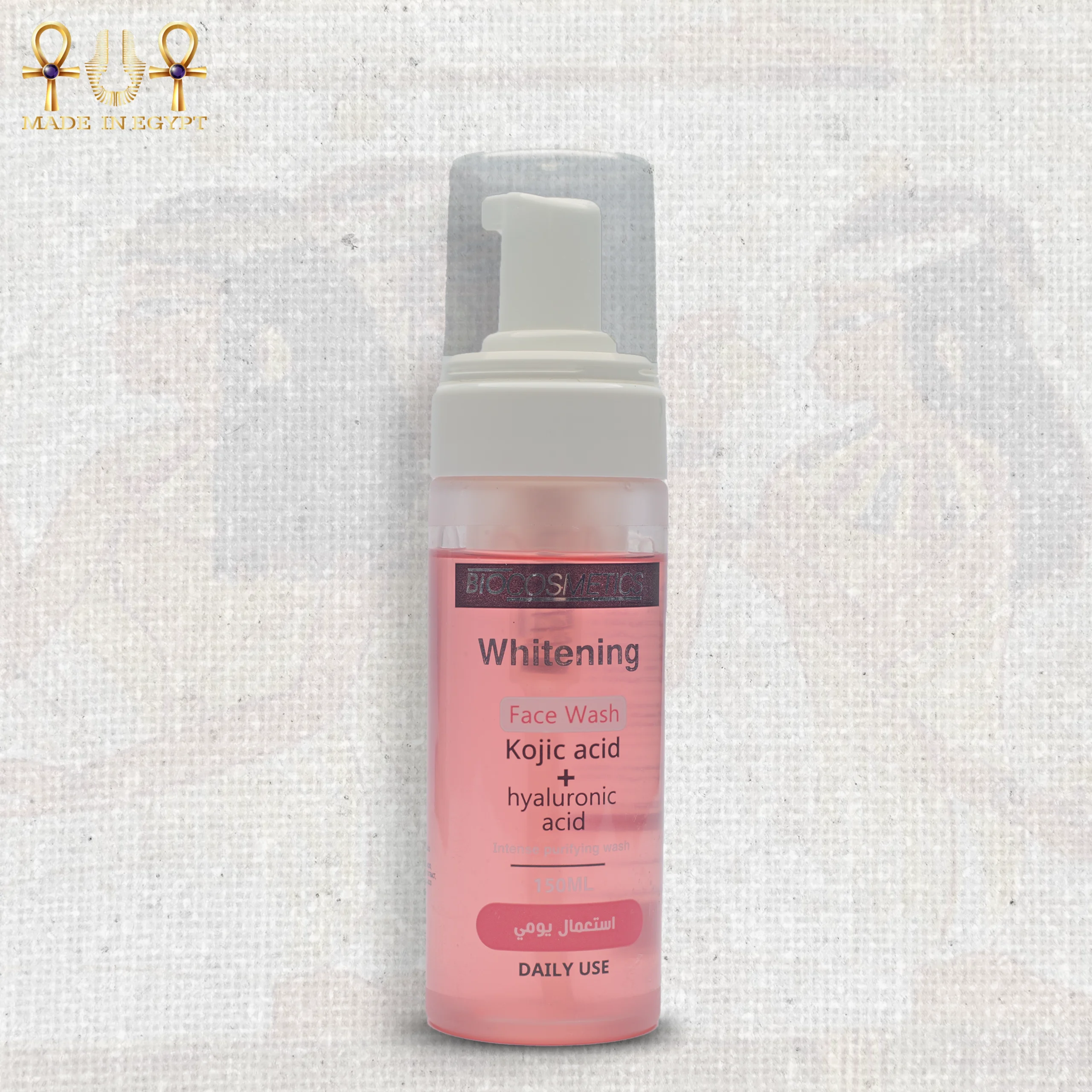 Whitening Face Wash(1) copy Whitening face wash bottle with kojic acid and hyaluronic acid, standing upright on a textured background.