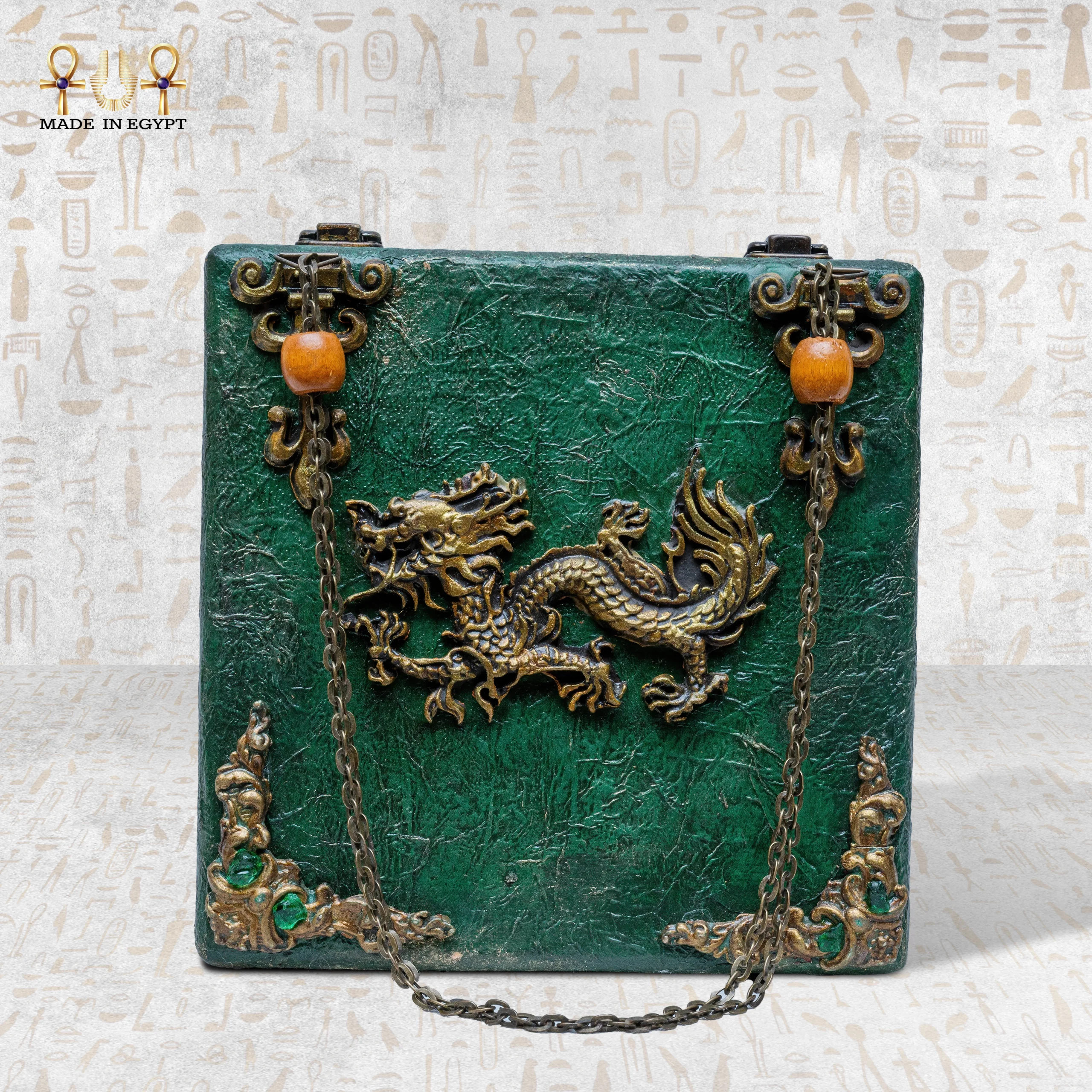 Abundance Energy Bag – Dragon Motif with Antique Chain Handle Green wooden bag with golden dragon and antique chain handle