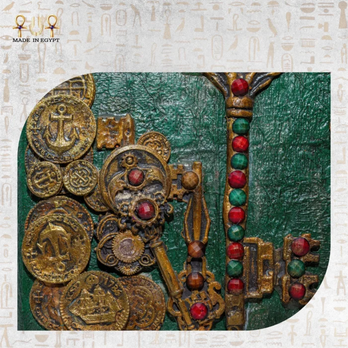 Close-up of golden coins and intricate key design with gemstones