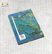 Artistic notebook featuring Vincent van Gogh’s Almond Blossoms painting on a blue background