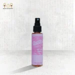 Barbie perfume bottle 60ml with pink marbled label and spray nozzle.