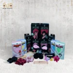 A complete display of Black Cat haircare and beauty essentials including satin bonnets, satin pillowcases, microfiber towels, exfoliating towels, hair accessories, and combs.