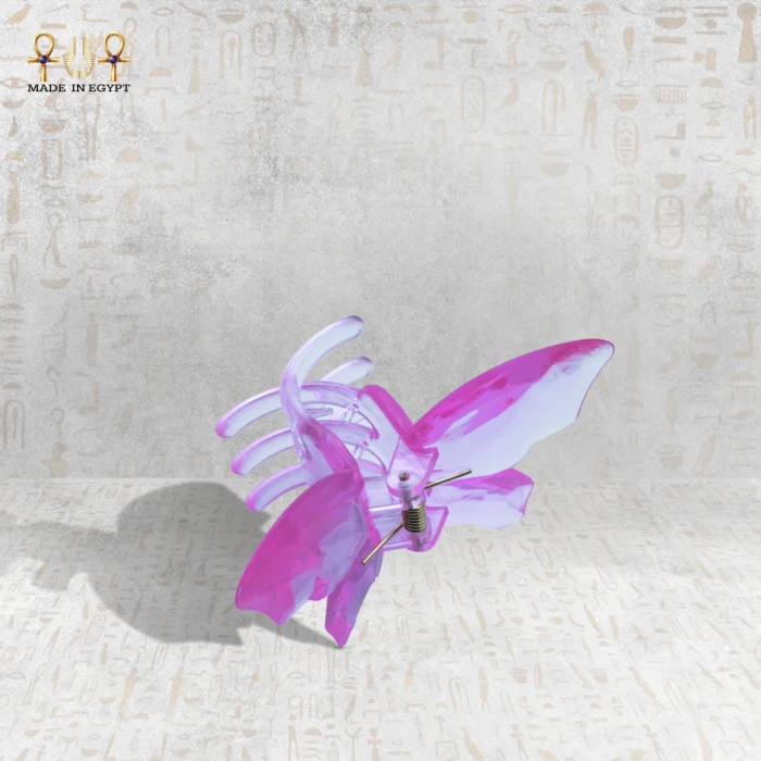 Butterfly hair clip from a side angle, showing both the front and back wings along with the spring mechanism.