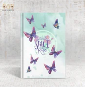 Butterfly notebook with a mint green watercolor background and “And Still I Rise” quote surrounded by flying butterflies.