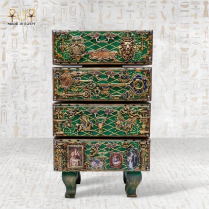 Front view of the Cabinet of Secrets, a handcrafted symbolic drawer unit with green and gold detailing.