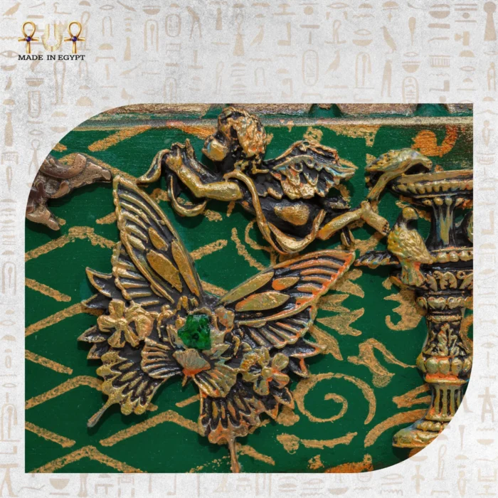 Close-up of butterfly and floral details on the Cabinet of Secrets.