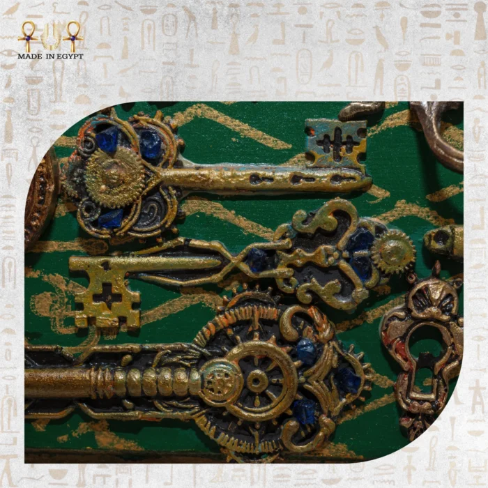 Close-up of ornate antique-style keys with blue jewel inlays on the Cabinet of Secrets drawer.