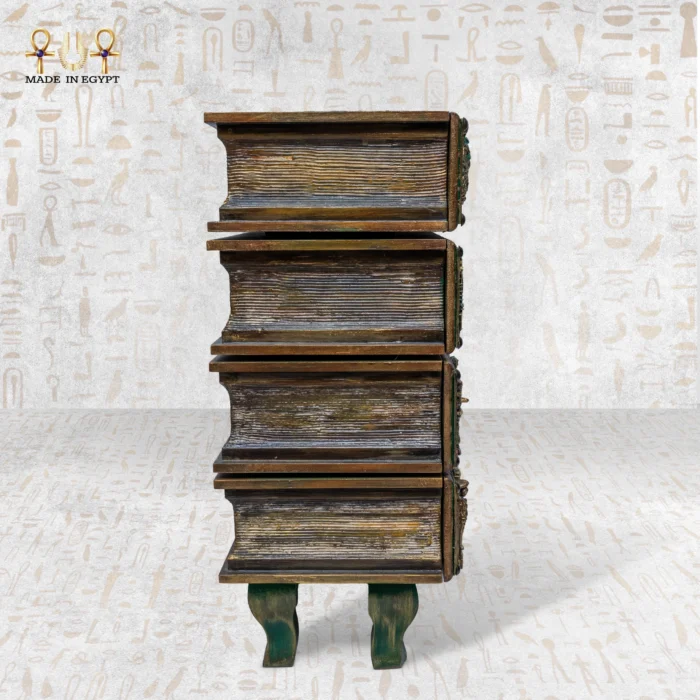 Side profile of the Cabinet of Secrets showing stacked-book structure.
