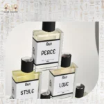 Close-up of Fallin perfumes – Peace, Style, and Love fragrance bottles